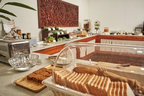 Daily buffet breakfast (USD 8 per person)