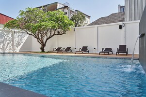Outdoor pool, pool umbrellas, pool loungers