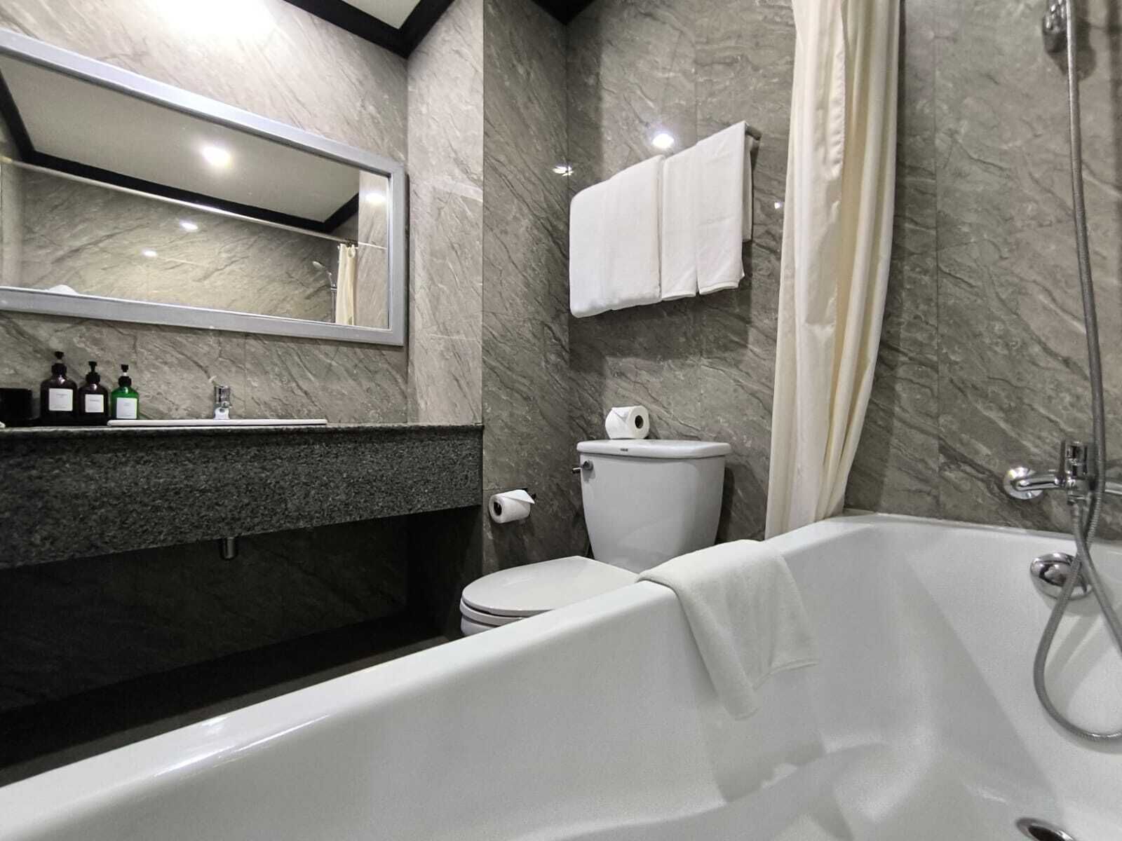 family room | bathroom | hair dryer, bathrobes, slippers, towels