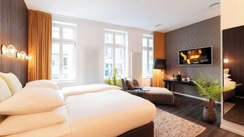 Hypoallergeen beddengoed, een minibar, een kluis op de kamer, een bureau
