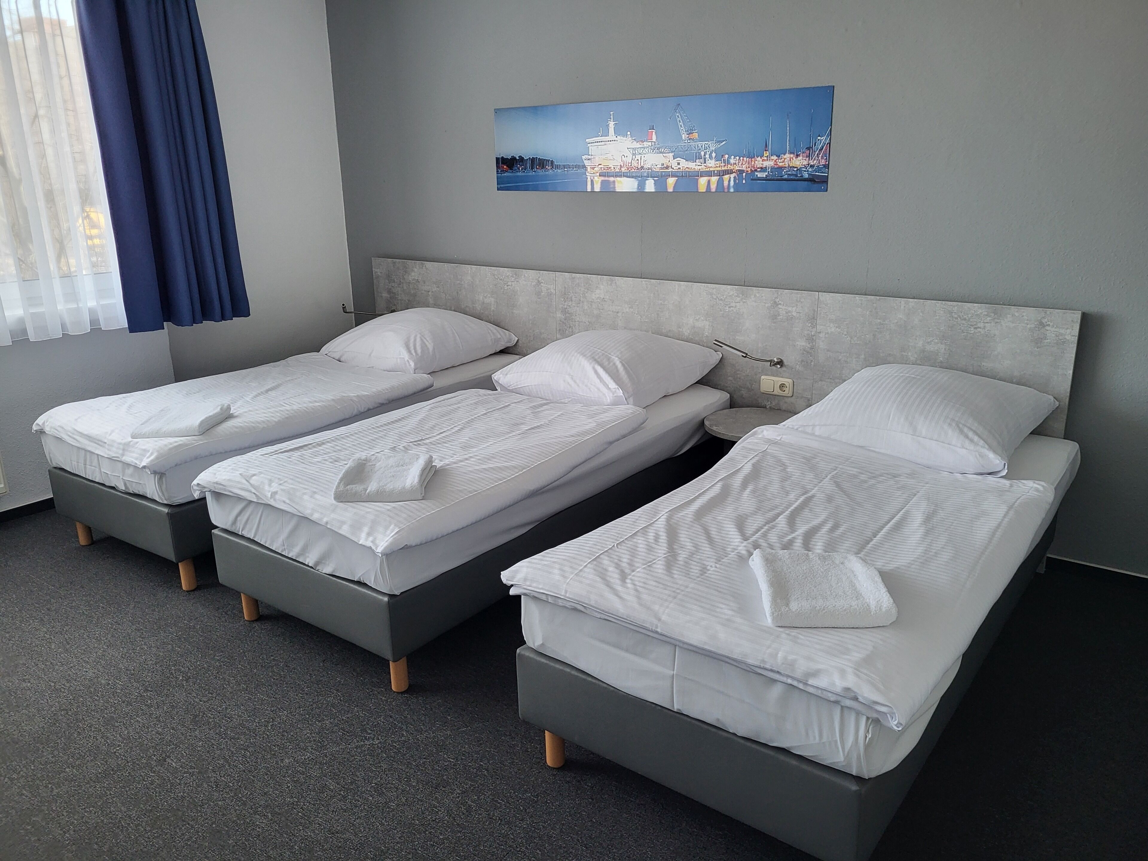 Triple Room, Shared Bathroom | Laptop workspace, iron/ironing board, free WiFi, bed sheets