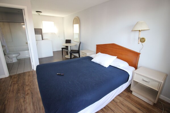 Standard Double Room, 2 Queen Beds | Living area | Flat-screen TV