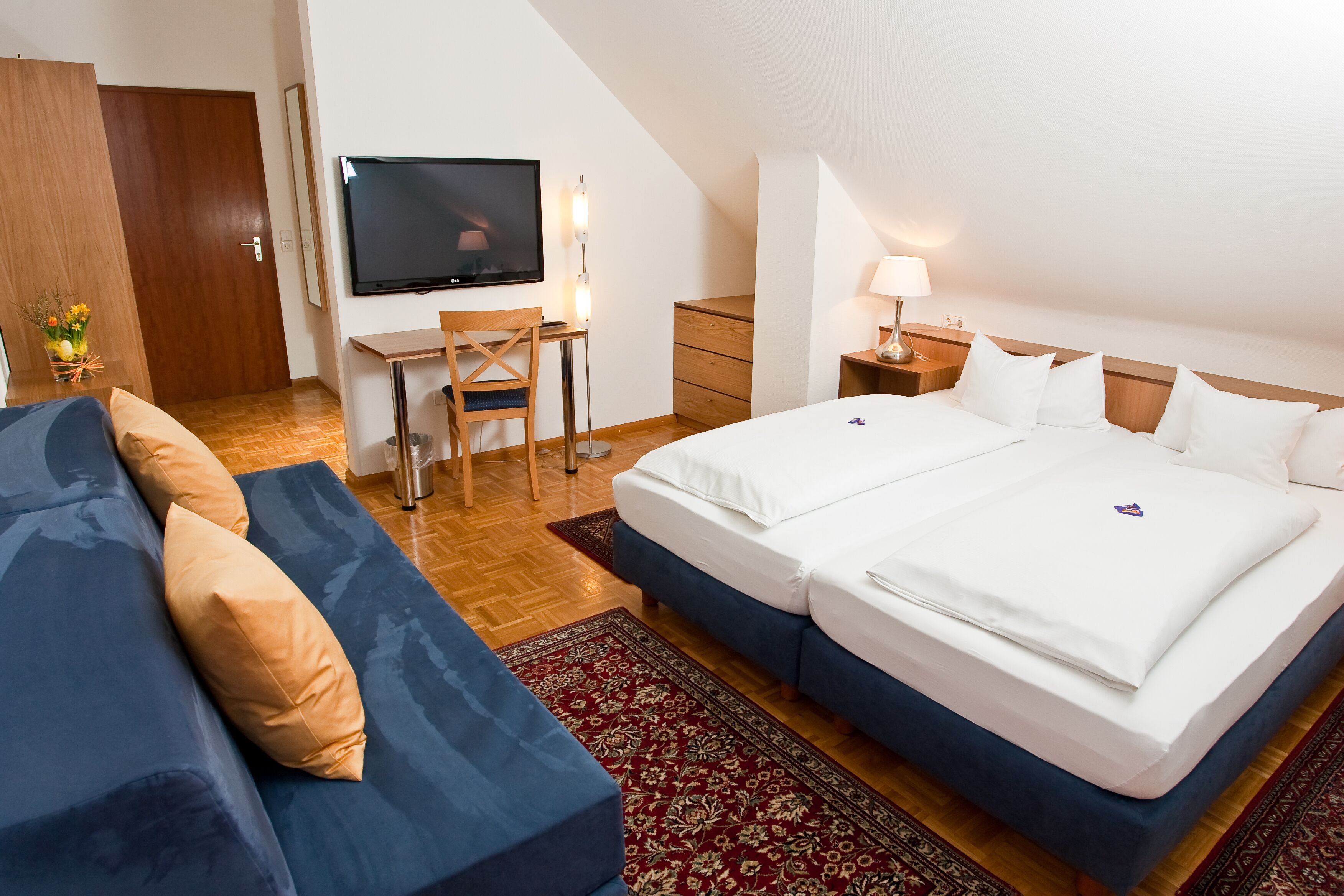 premium bedding, desk, blackout curtains, iron/ironing board