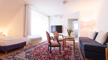 Premium bedding, desk, blackout drapes, iron/ironing board