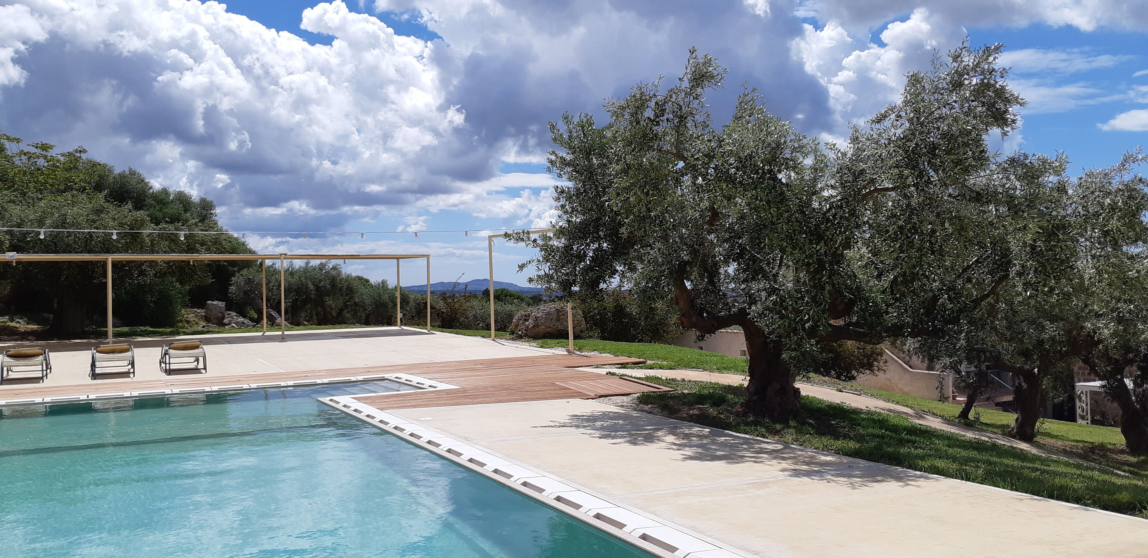 outdoor pool, pool loungers