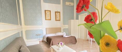 Junior Suite | 1 bedroom, premium bedding, down comforters, minibar