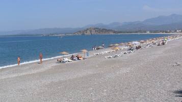 Beach nearby, sun loungers, beach umbrellas
