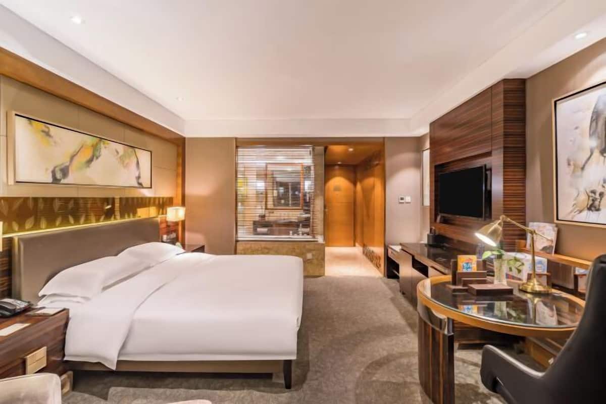 Couette en duvet d'oie, coffres-forts dans les chambres, bureau