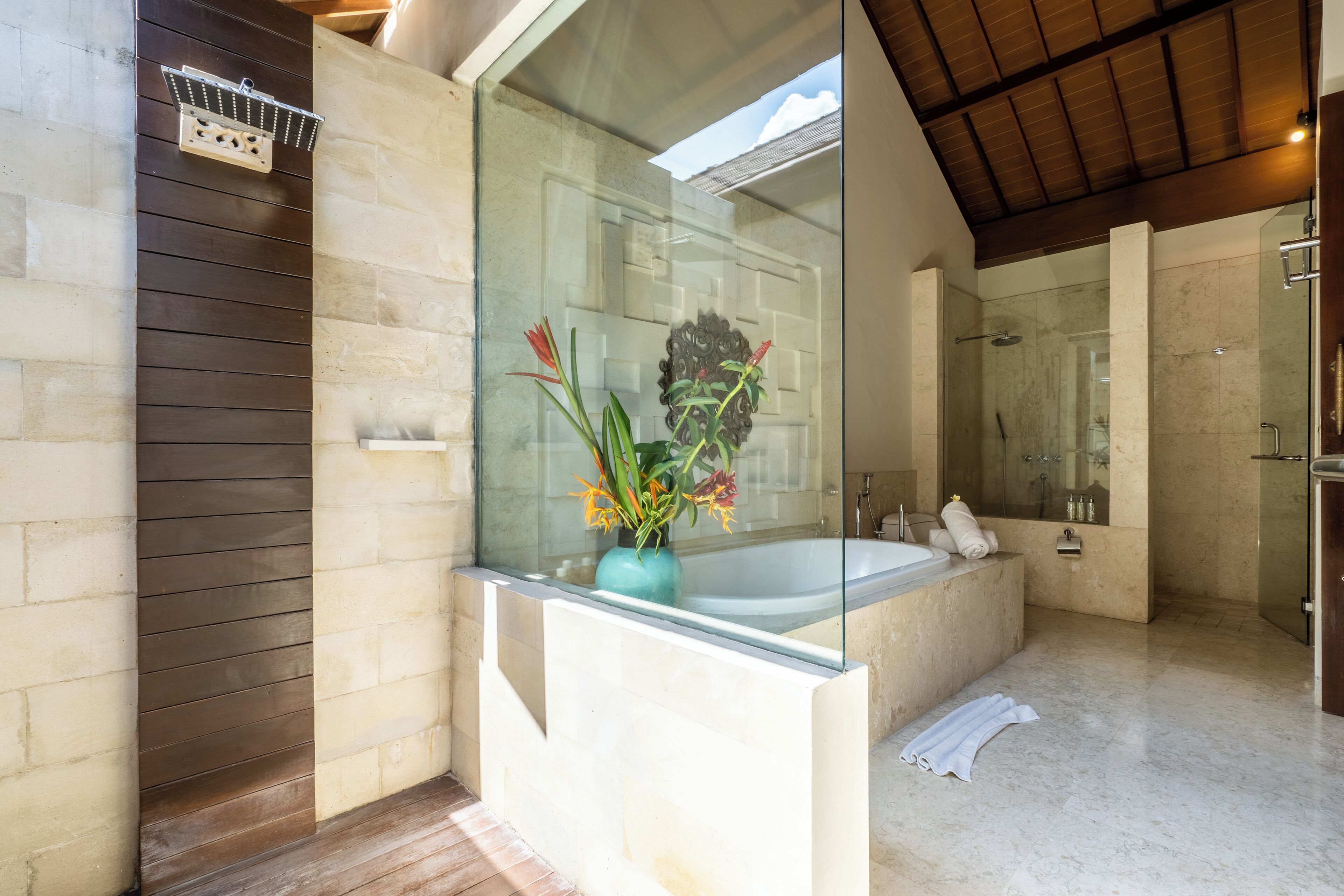 Separate tub and shower, rainfall showerhead, free toiletries