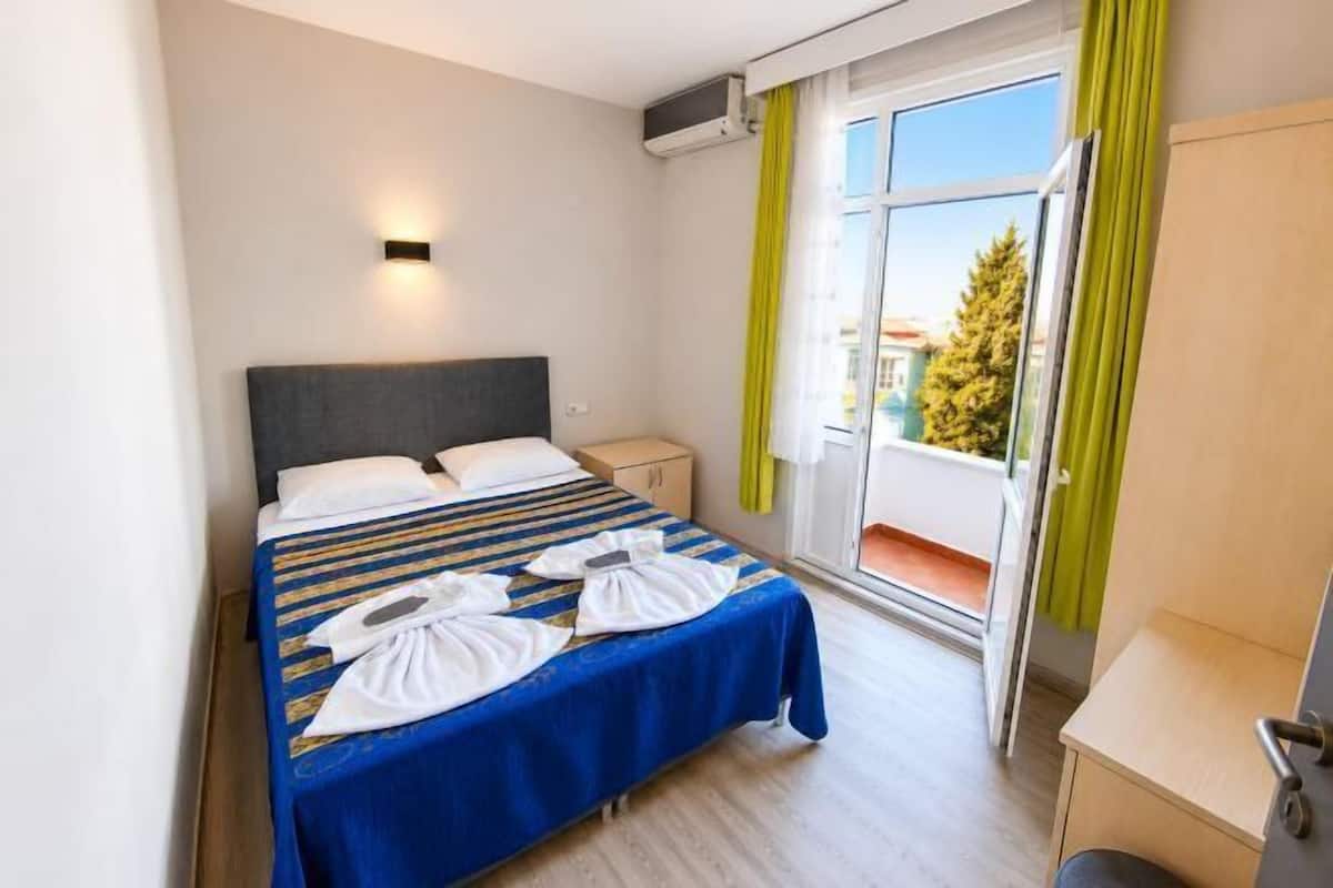 Premium bedding, desk, blackout curtains, soundproofing