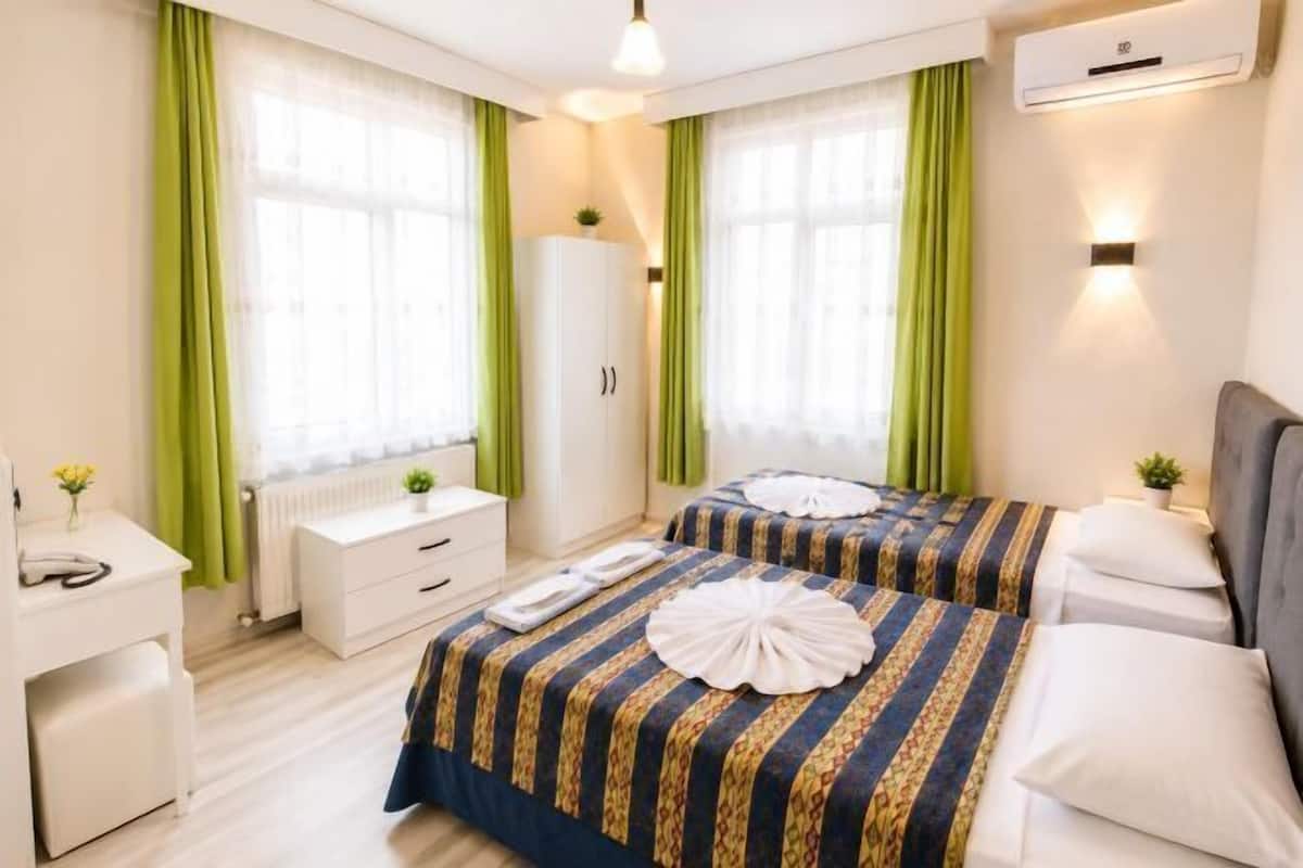 Premium bedding, desk, blackout curtains, soundproofing