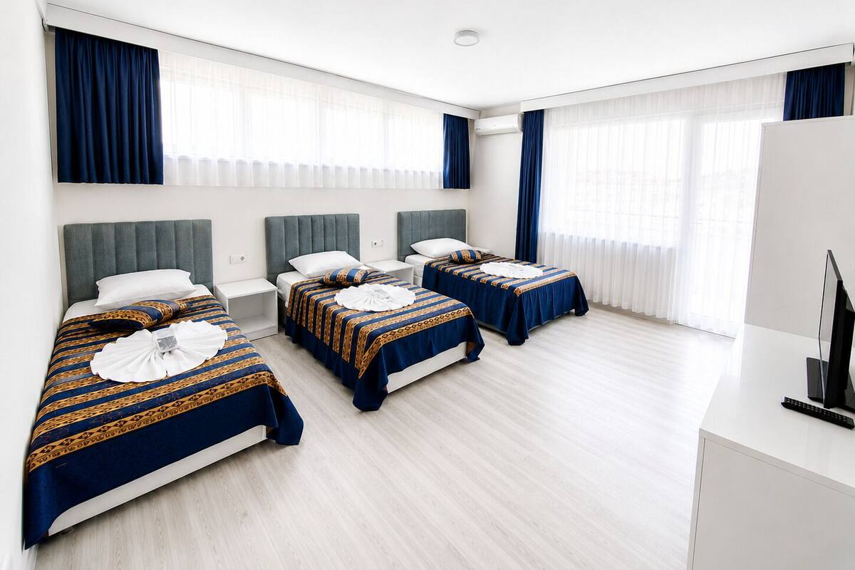 Family Quadruple Room, Terrace, City View | Premium bedding, individually decorated, individually furnished, desk