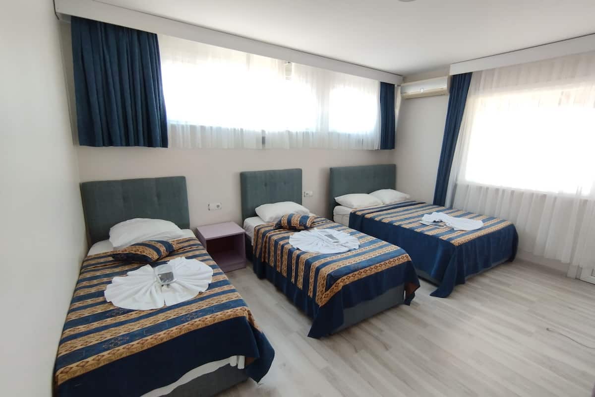 Family Quadruple Room, Terrace, City View | Premium bedding, individually decorated, individually furnished, desk