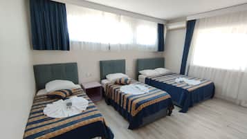 Family Quadruple Room, Terrace, City View | Premium bedding, individually decorated, individually furnished, desk