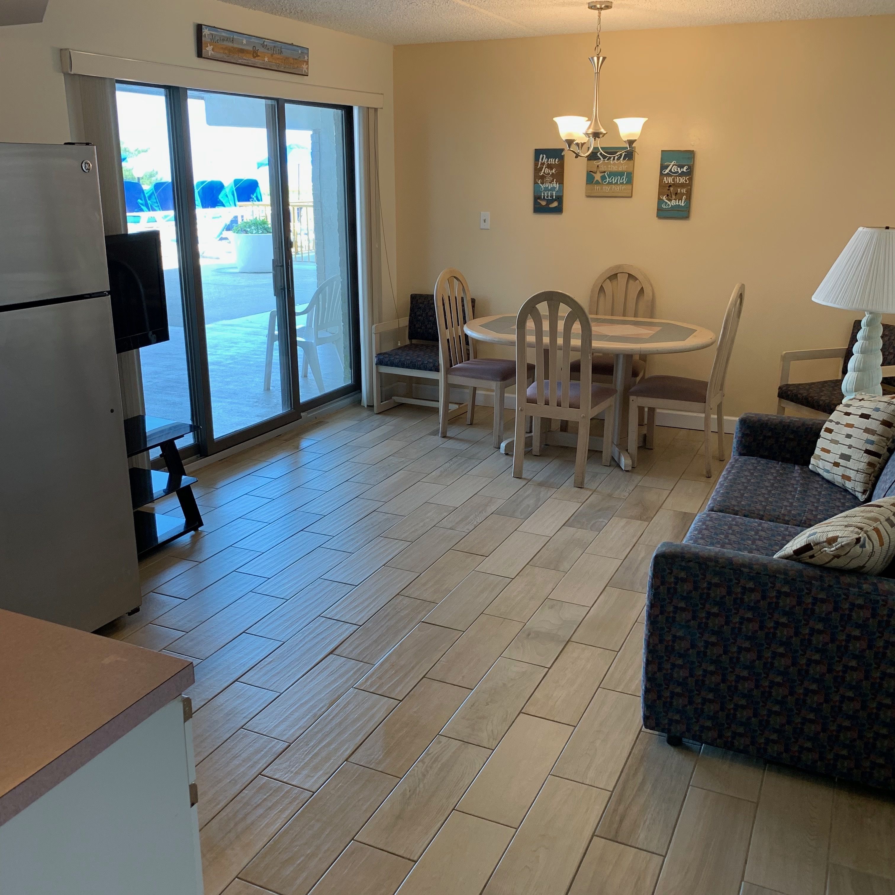 2 Bedroom Efficiency Suite (I) | Living area | Flat-screen TV