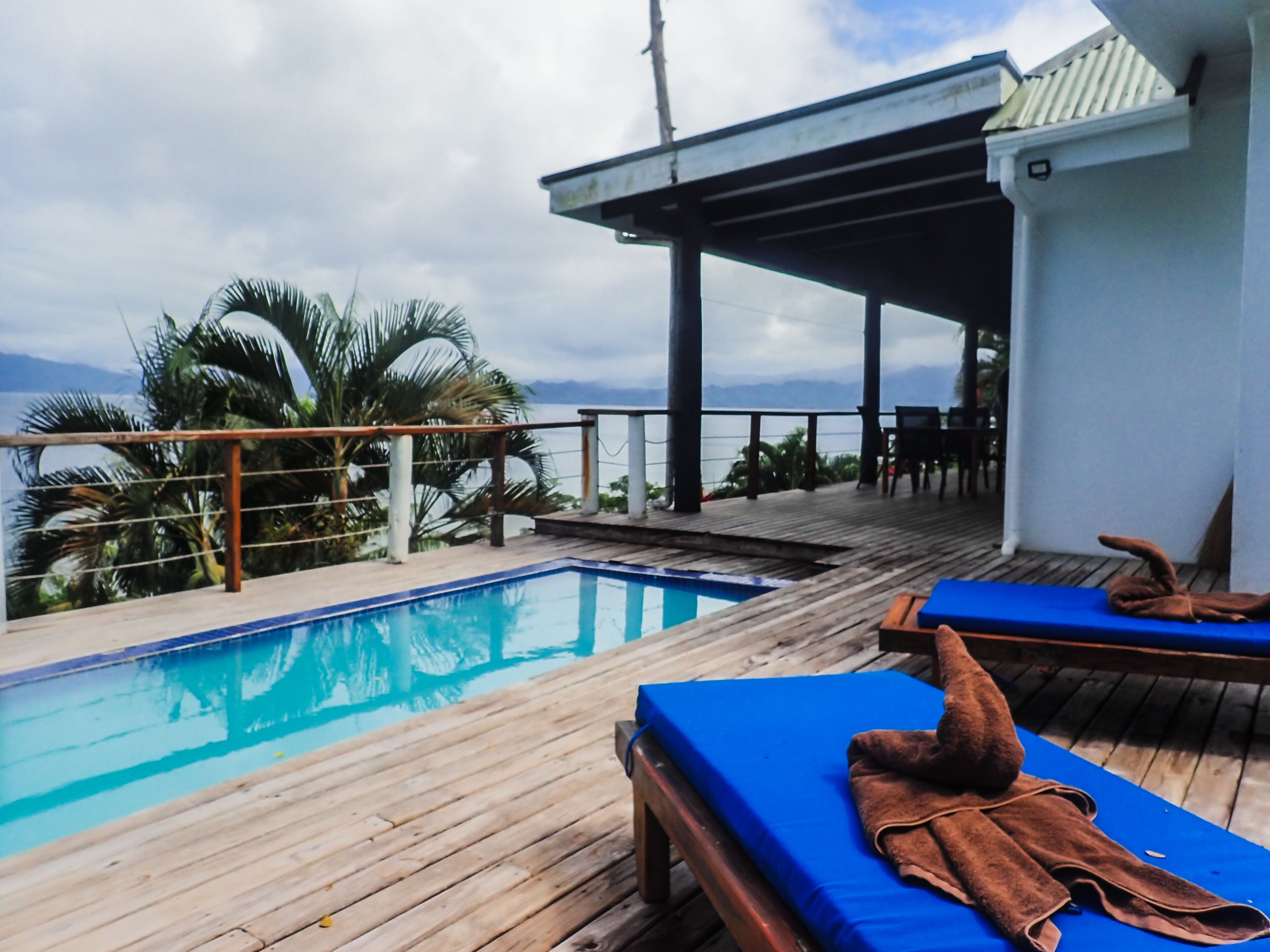 outdoor pool, pool umbrellas, pool loungers