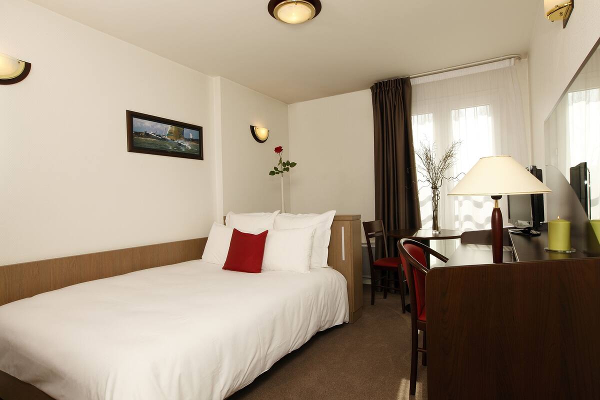 Desk, iron/ironing board, cribs (free), WiFi (free)