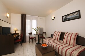 Apartment | Living room | LCD TV - Appart'City Saint Maurice (Saint-Maurice)