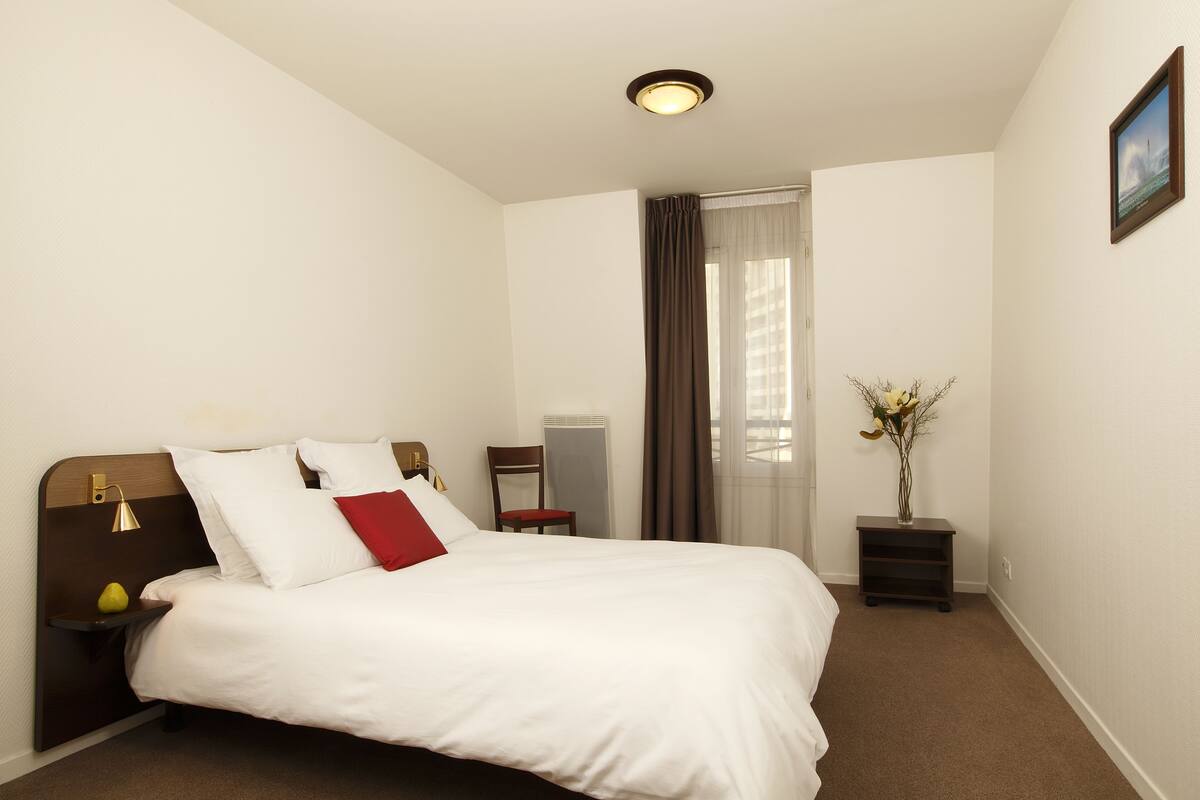 Desk, iron/ironing board, cribs (free), WiFi (free)