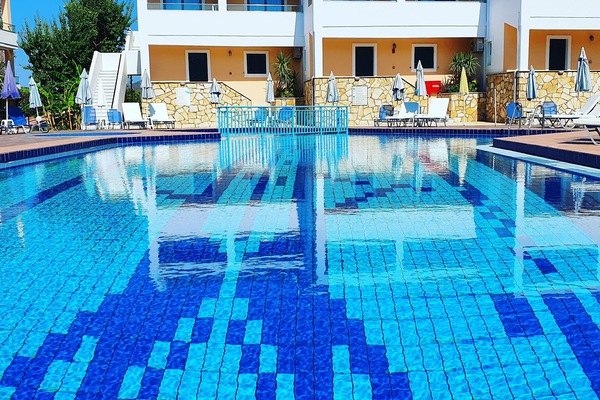 Outdoor pool, pool umbrellas, sun loungers