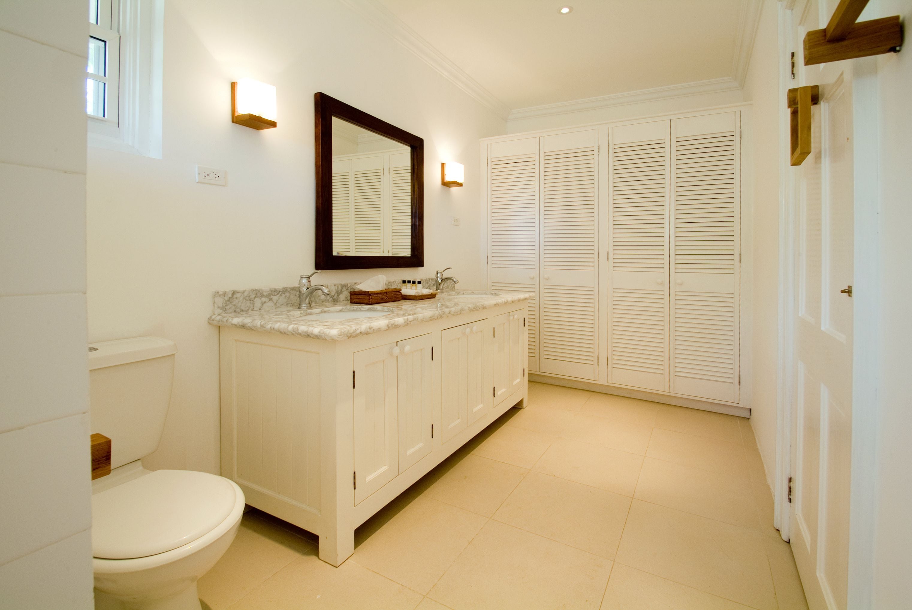 deluxe suite, 1 bedroom | bathroom | designer toiletries, hair dryer, bathrobes, towels