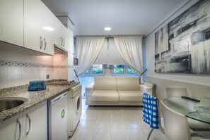 Apartment, 1 Bedroom (3 people) | Living room | 32-inch flat-screen TV with digital channels, TV