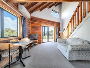 Spa Beachfront Chalet | Living area | LCD TV, DVD player - Shining Star Beachfront Accommodation (Hokitika)