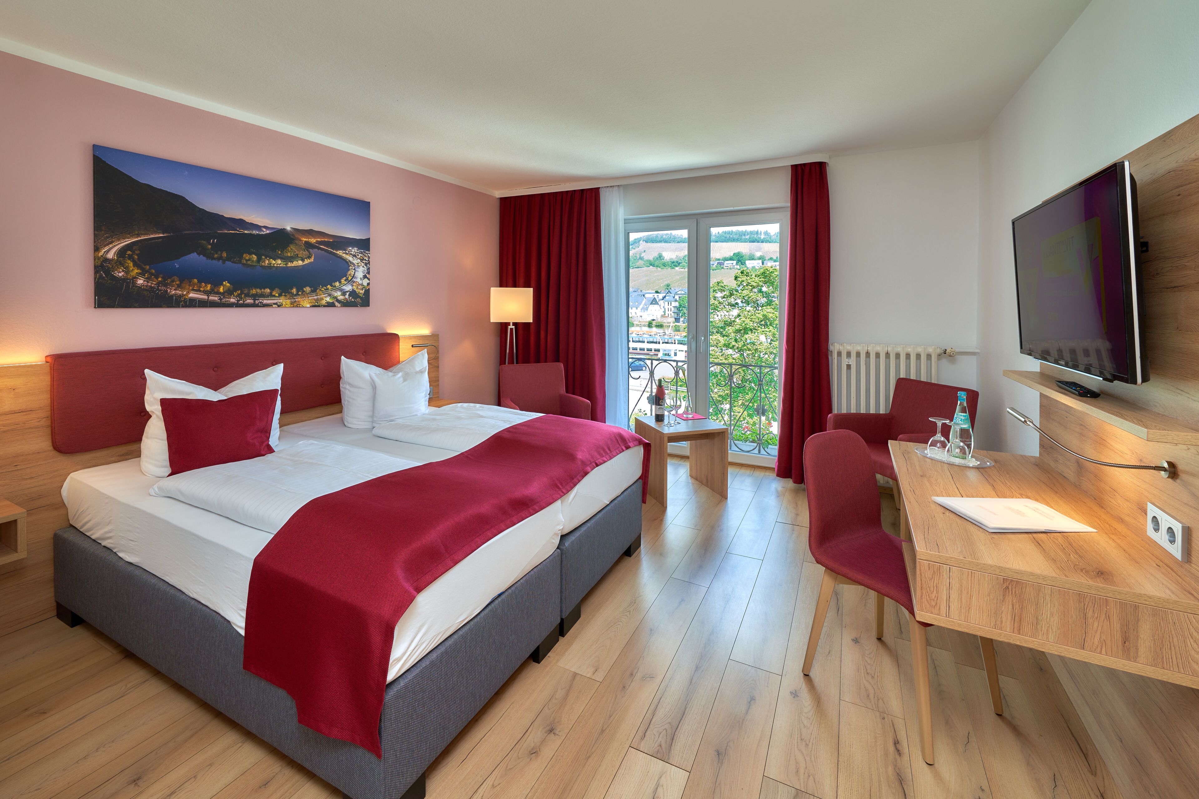 double room, river view | minibar, in-room safe, desk, free cots/infant beds