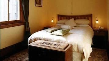 Camas com colchões pillow-top, quartos à prova de som