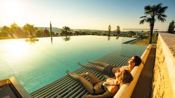 4 indoor pools, 4 outdoor pools, pool umbrellas, sun loungers