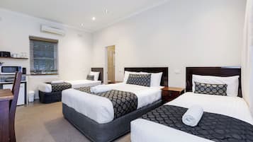 Executive Family Room | Premium bedding, desk, iron/ironing board, free WiFi