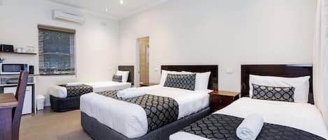 Premium bedding, desk, iron/ironing board, free WiFi