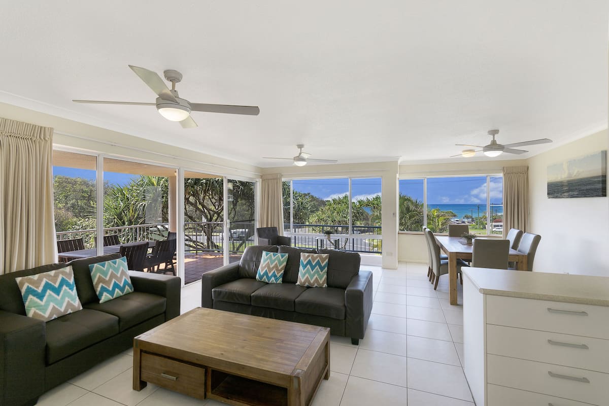Executive Apartment, 3 Bedrooms, 2 Bathrooms, Sea View | Living area | 50-inch TV with cable channels, DVD player
