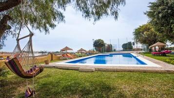 Seasonal outdoor pool, sun loungers