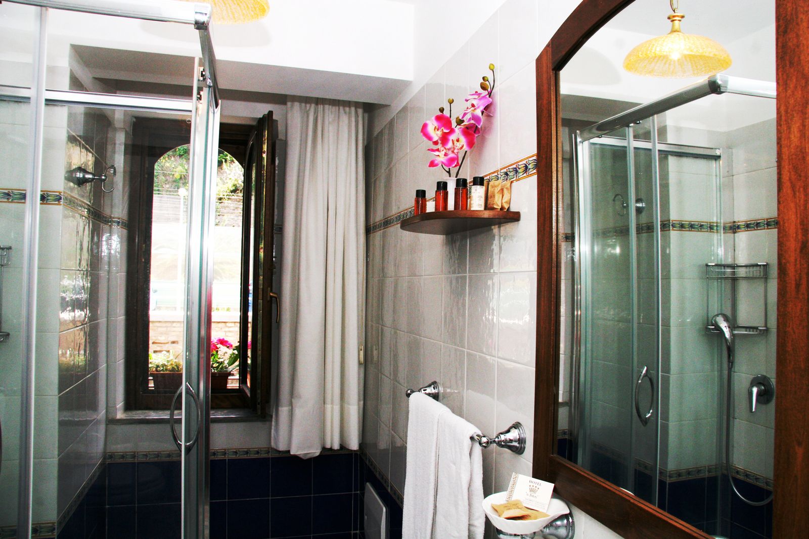 shower, designer toiletries, hair dryer, dressing gowns