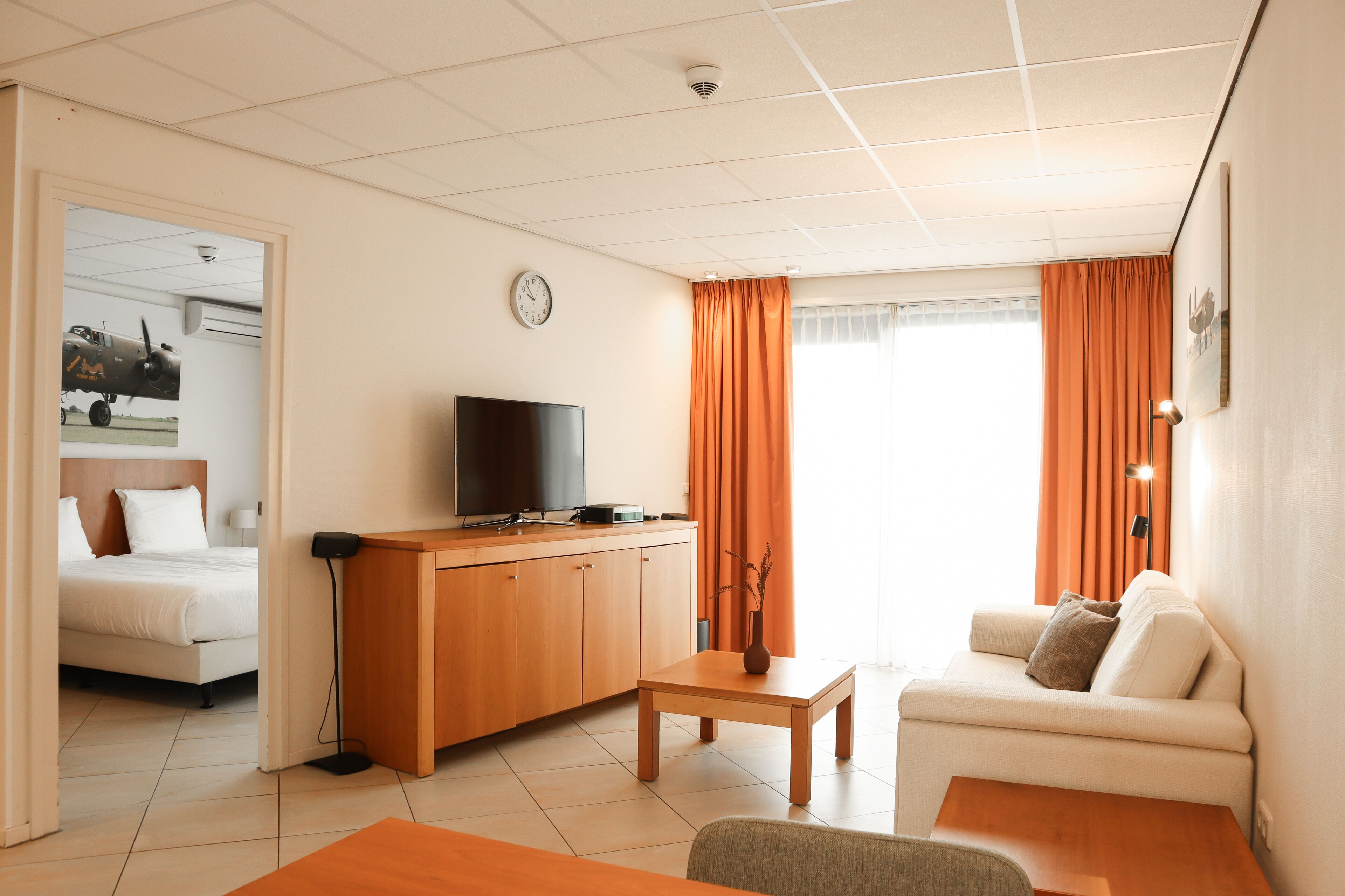 standard suite, 1 bedroom | living area | 52-cm smart tv with cable channels, tv, dvd player