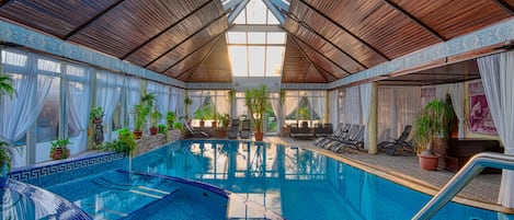 Indoor pool, seasonal outdoor pool, pool umbrellas, sun loungers