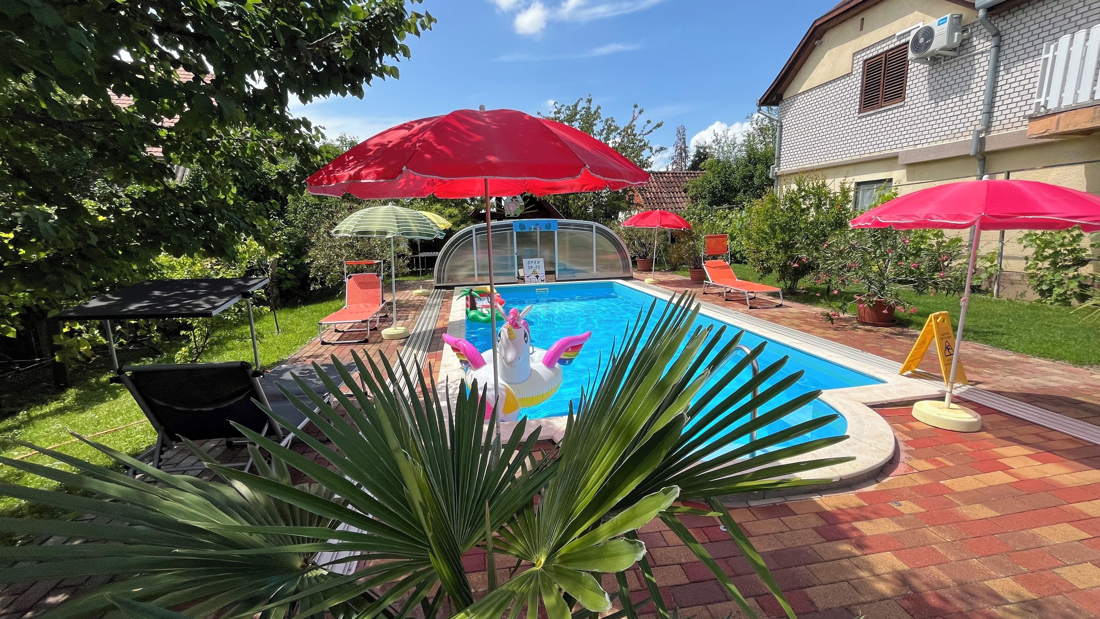seasonal outdoor pool, pool umbrellas, pool loungers