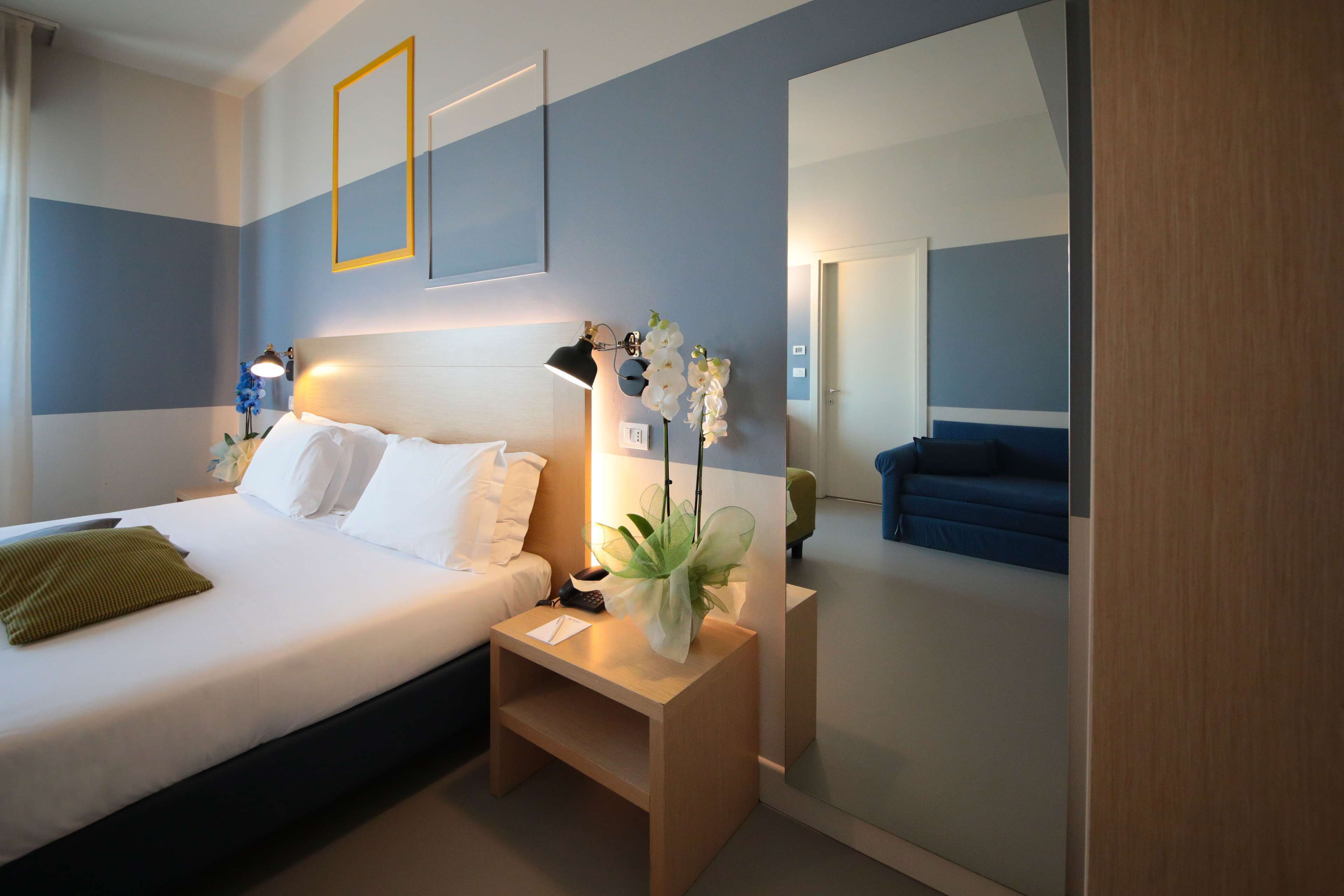 standard triple room, multiple beds | minibar, in-room safe, desk, soundproofing