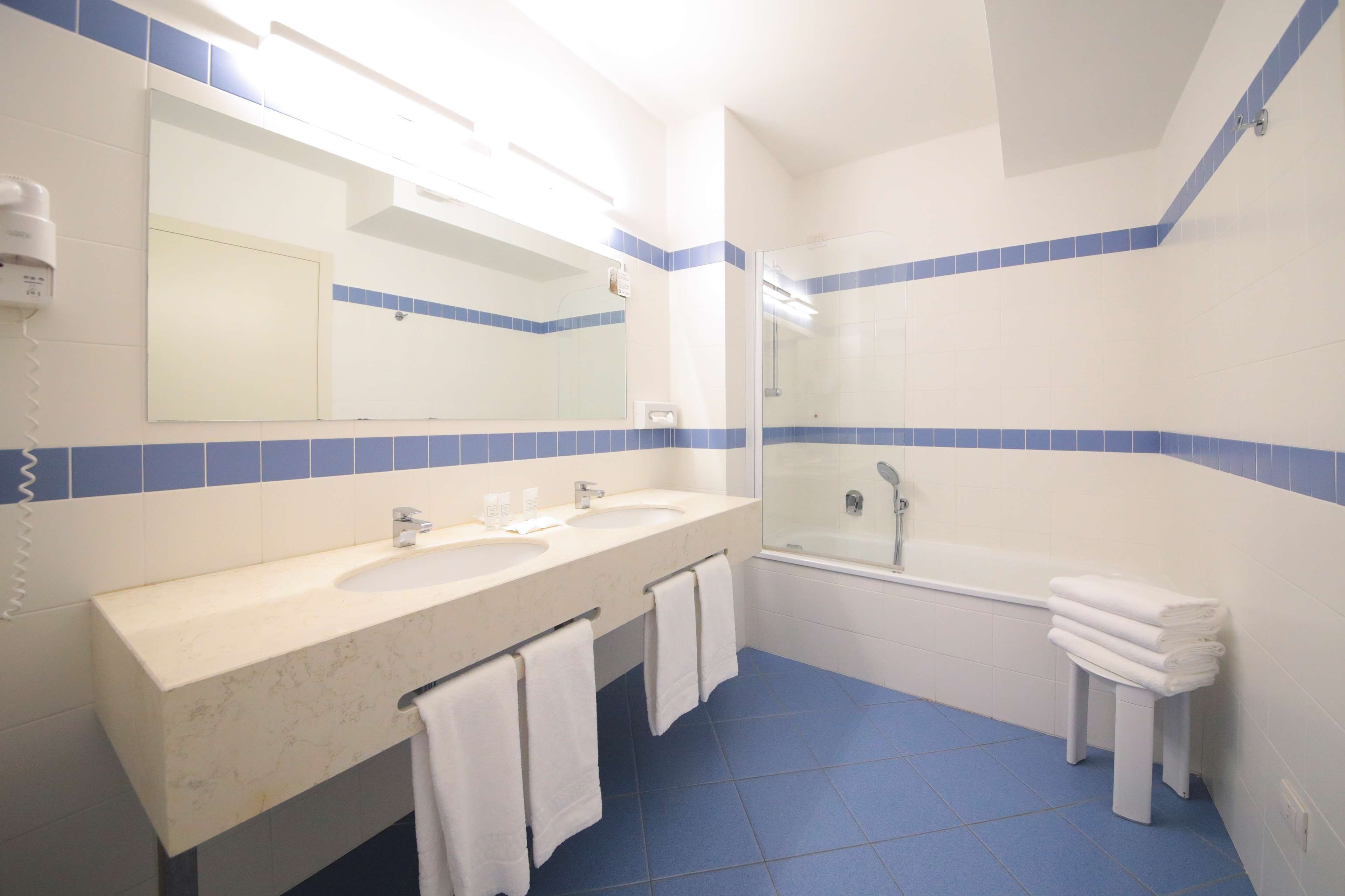 free toiletries, hair dryer, bidet, towels