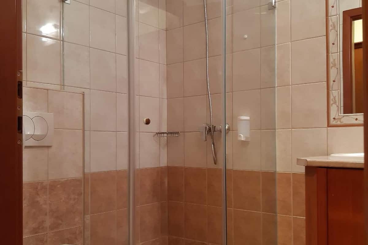 hair dryer, bathrobes, towels