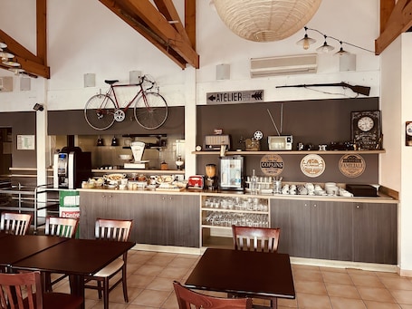 Daily buffet breakfast for a fee. Ever Route 64 Brit Hotel Tarbes Ibos