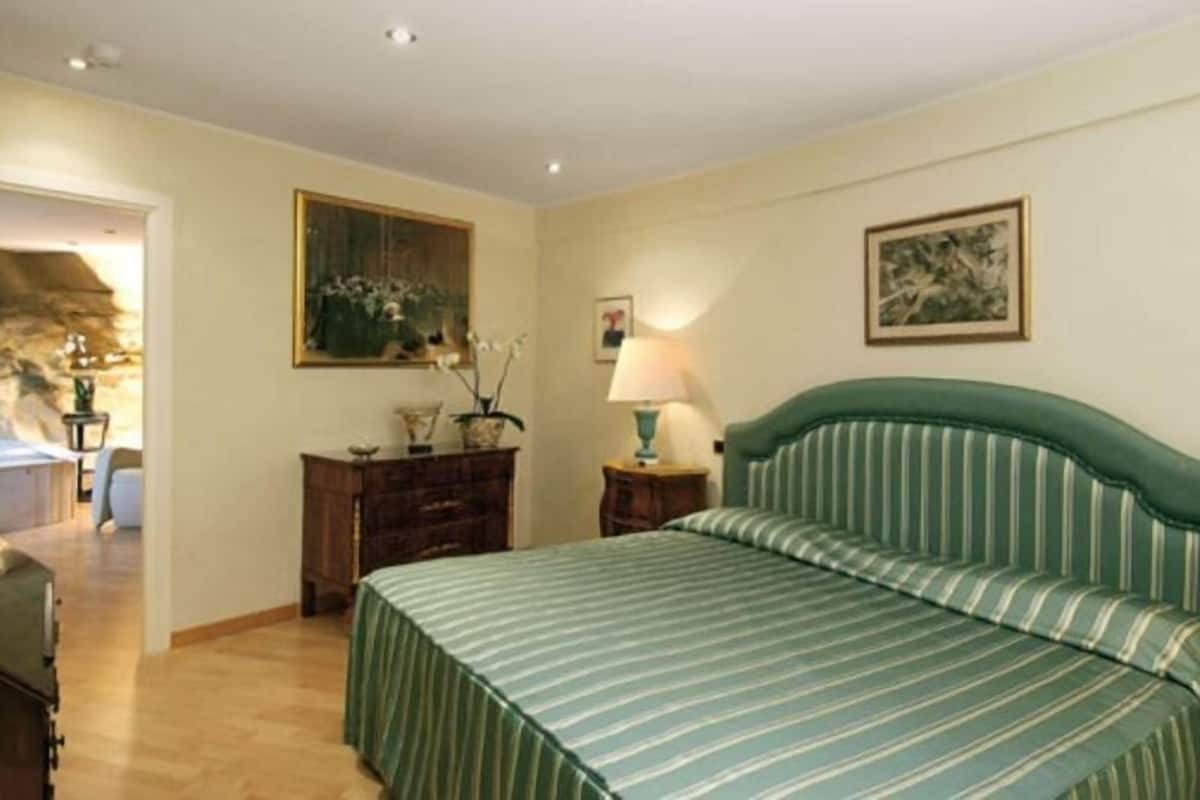 Suite Exclusive, bain à remous | 1 chambre, draps en coton égyptien, literie de qualité supérieure