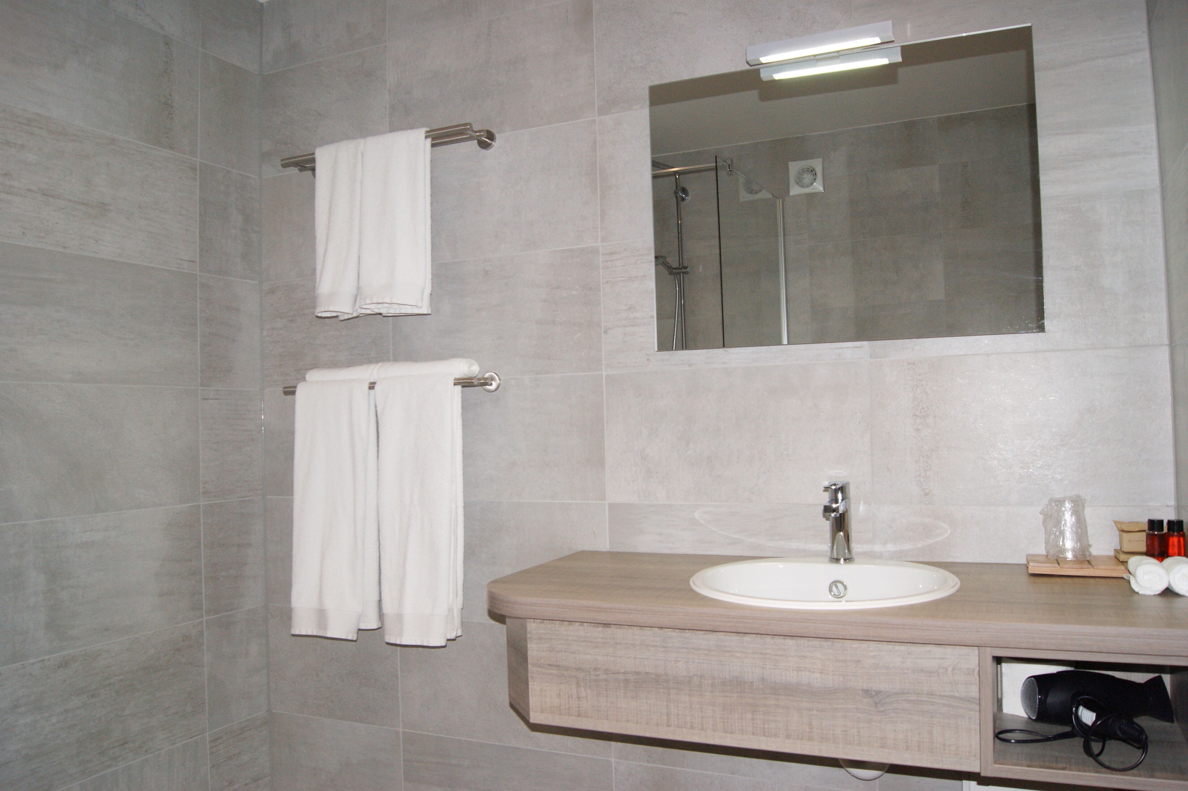 comfort room, 1 king bed | bathroom | shower, rainfall showerhead, free toiletries, hair dryer