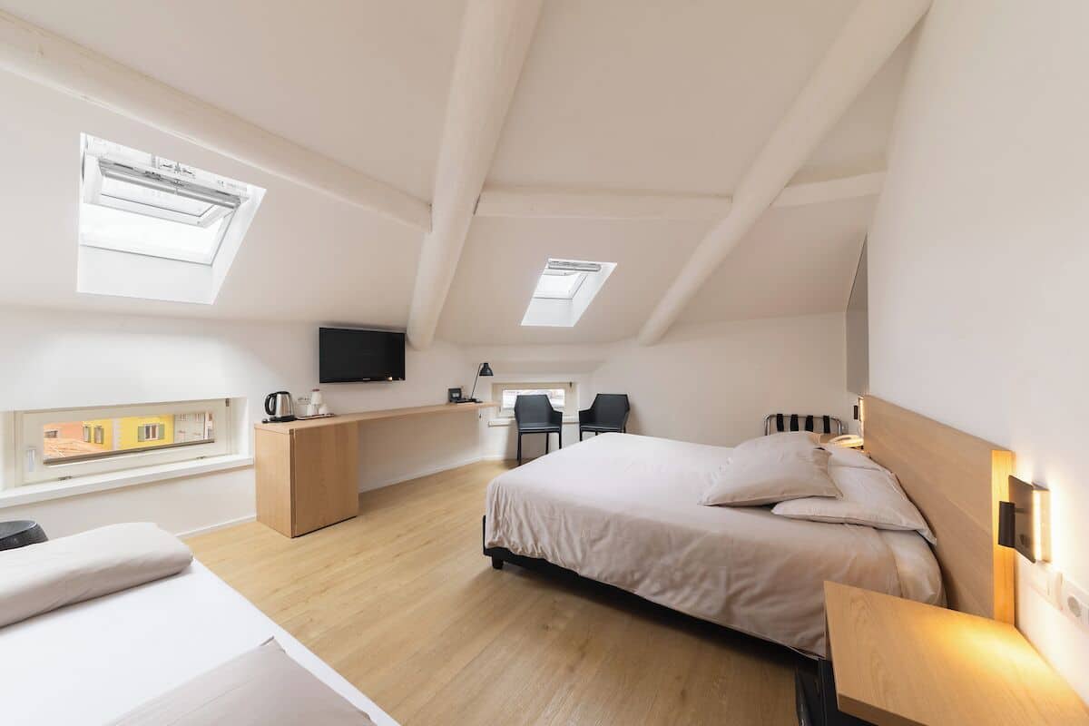 Hypo-allergenic bedding, down comforters, minibar, in-room safe