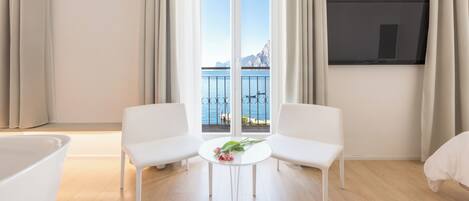 Standard Triple Room, Lake View | Hypo-allergenic bedding available, down comforters, minibar