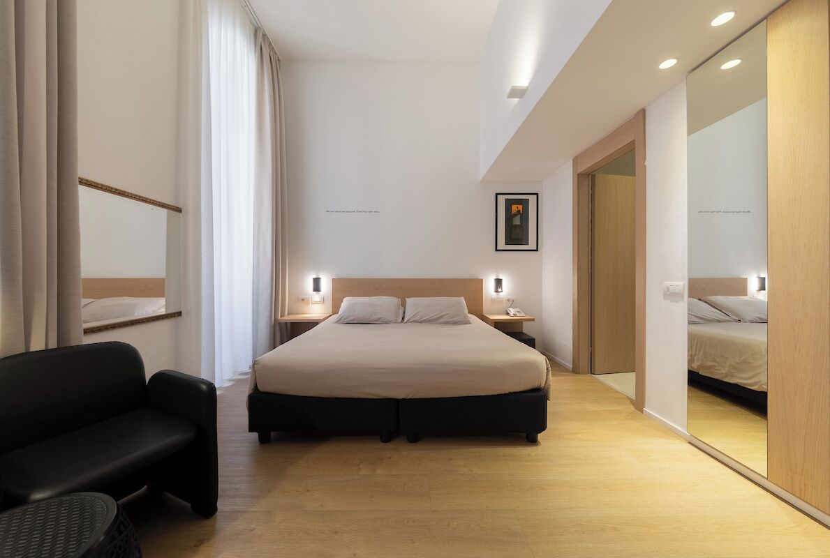 Hypo-allergenic bedding, down comforters, minibar, in-room safe