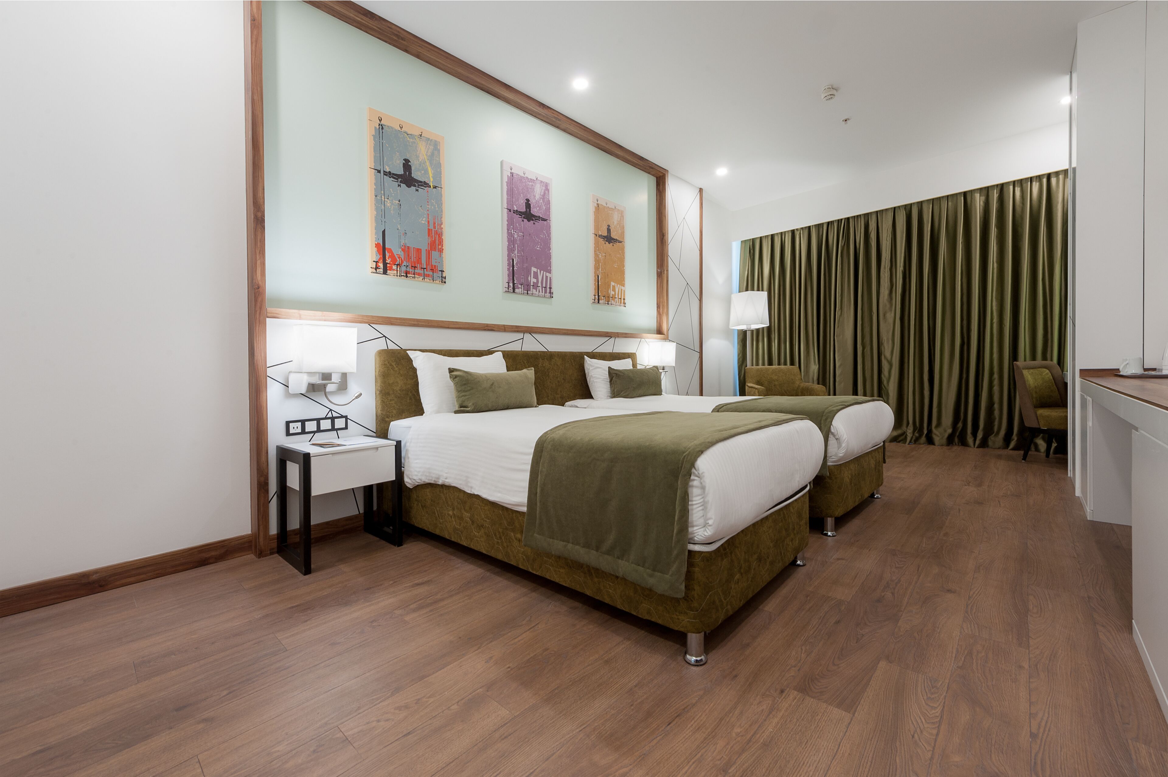 exclusive deluxe room | hypo-allergenic bedding, in-room safe, blackout curtains, soundproofing