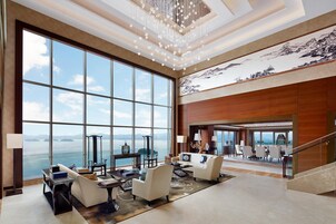 Premium bedding, down comforters, minibar, in-room safe