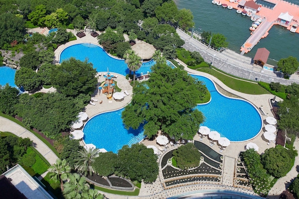 Indoor pool, seasonal outdoor pool, pool umbrellas, sun loungers